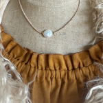 KOA necklace by Indigo & Wolfe with round pearl detail on a mannequin at Tomolly Carcoar.