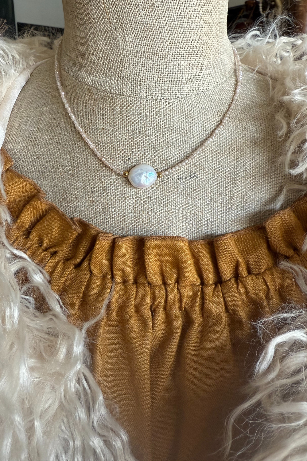 KOA necklace by Indigo & Wolfe with round pearl detail on a mannequin at Tomolly Carcoar.