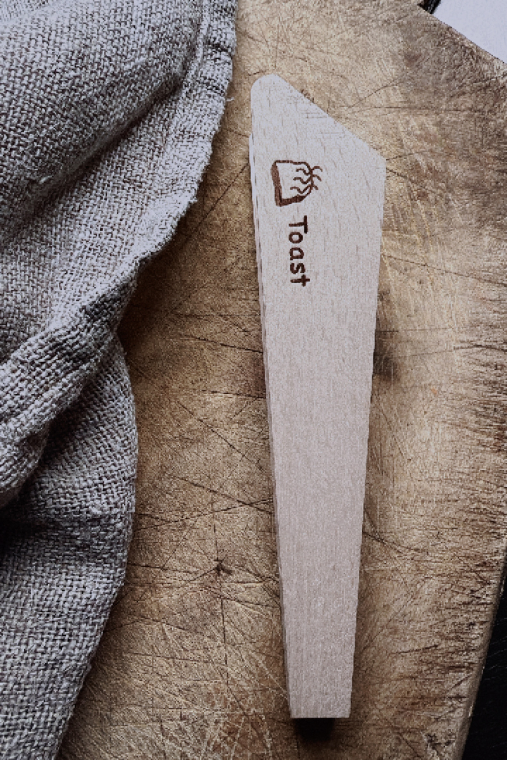 Redecker wooden toast tongs for safely removing toast shop at Tomolly.