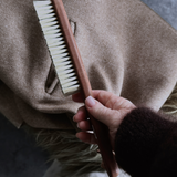 Redecker Cashmere Brush held by Belinda the Shopkeeper at Tomolly