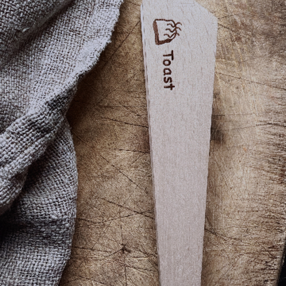 Redecker wooden toast tongs for safely removing toast shop at Tomolly.