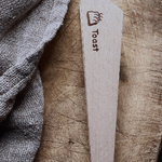 Redecker wooden toast tongs for safely removing toast shop at Tomolly.